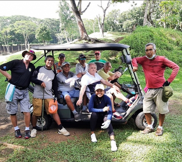 With golfing buddies, Golf & country club of Iligan inc